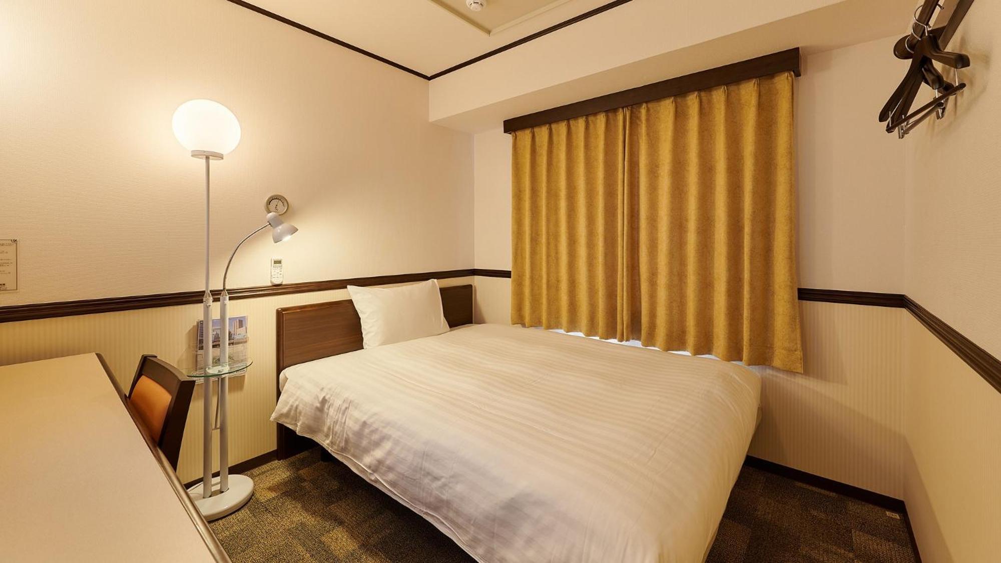 Toyoko Inn Osaka Itami Airport Tojonaka Pokoj fotografie