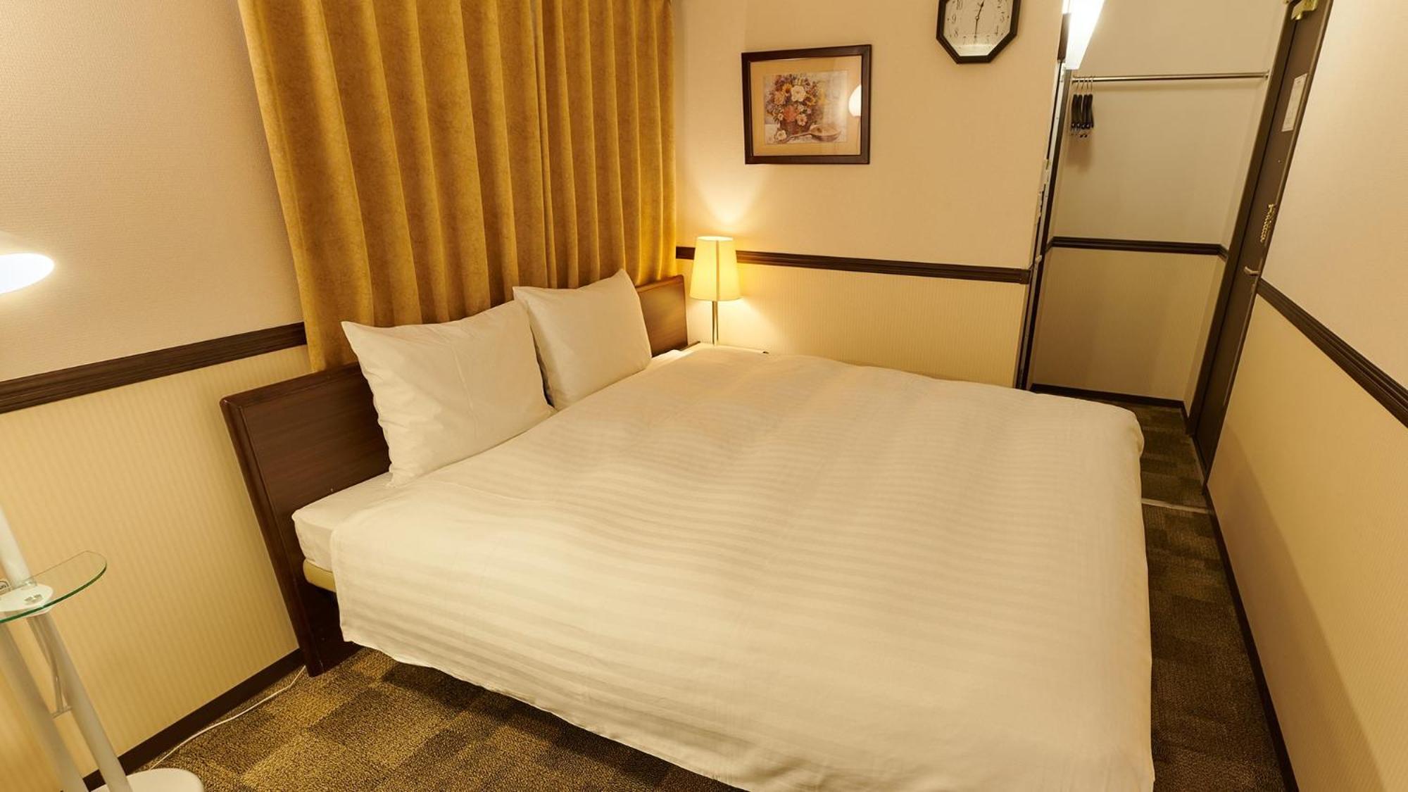 Toyoko Inn Osaka Itami Airport Tojonaka Pokoj fotografie
