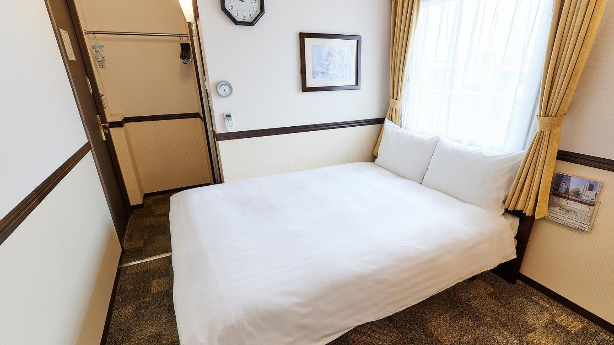 Toyoko Inn Osaka Itami Airport Tojonaka Pokoj fotografie