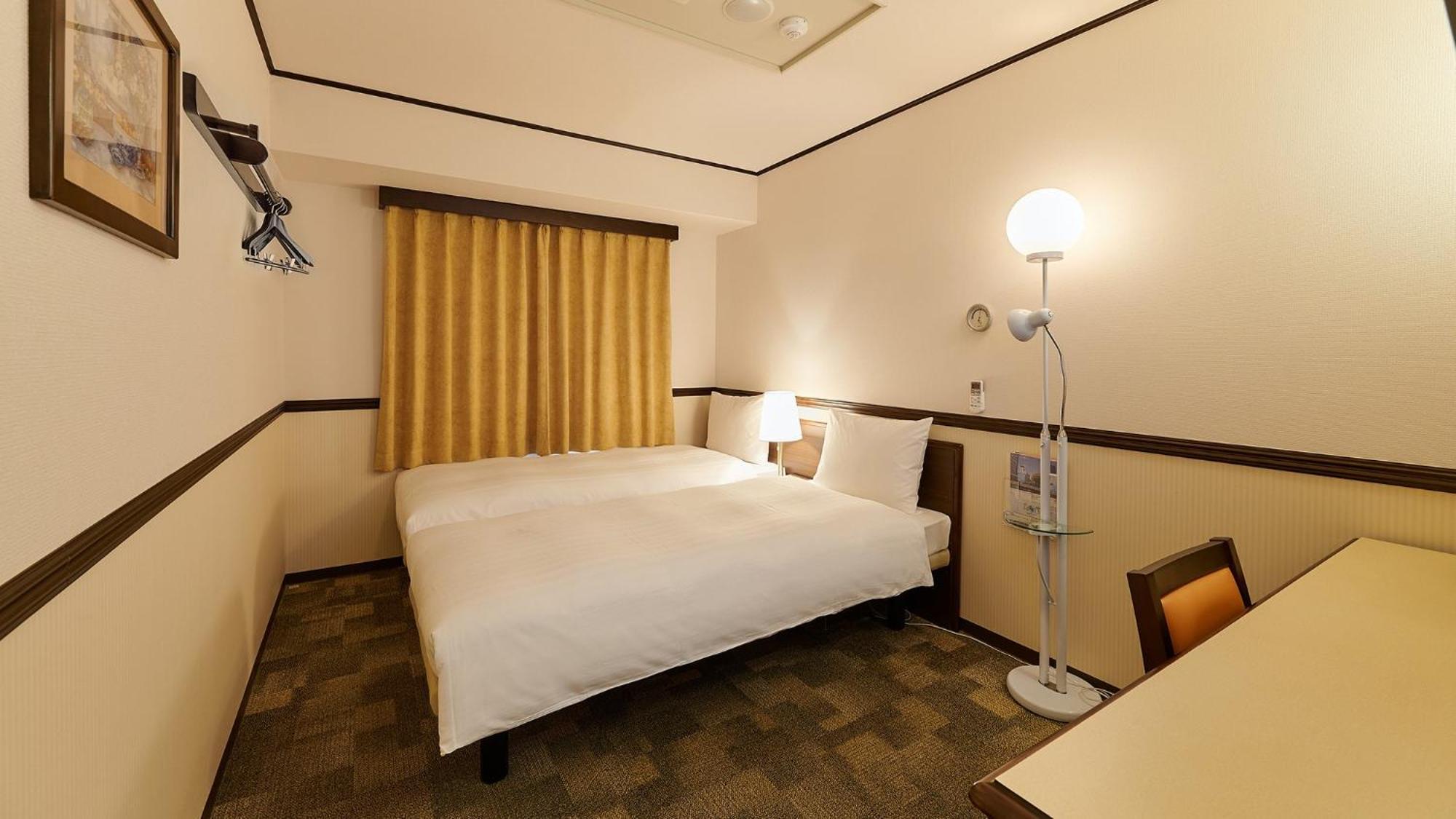 Toyoko Inn Osaka Itami Airport Tojonaka Pokoj fotografie