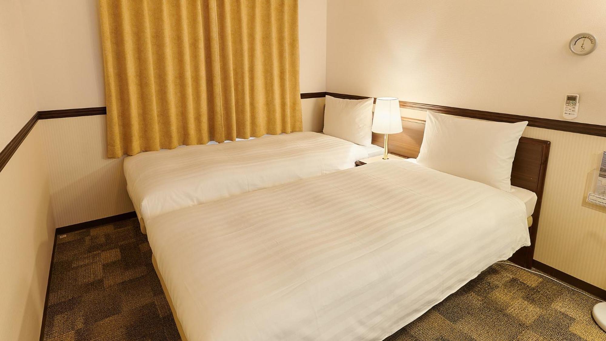 Toyoko Inn Osaka Itami Airport Tojonaka Pokoj fotografie
