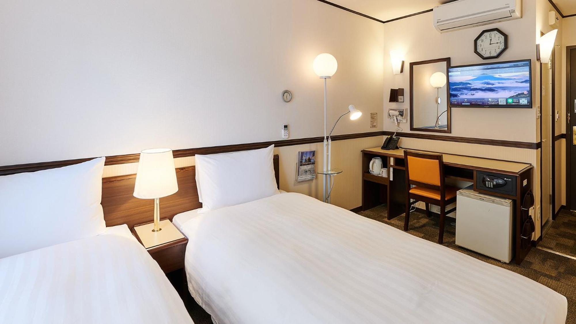 Toyoko Inn Osaka Itami Airport Tojonaka Pokoj fotografie