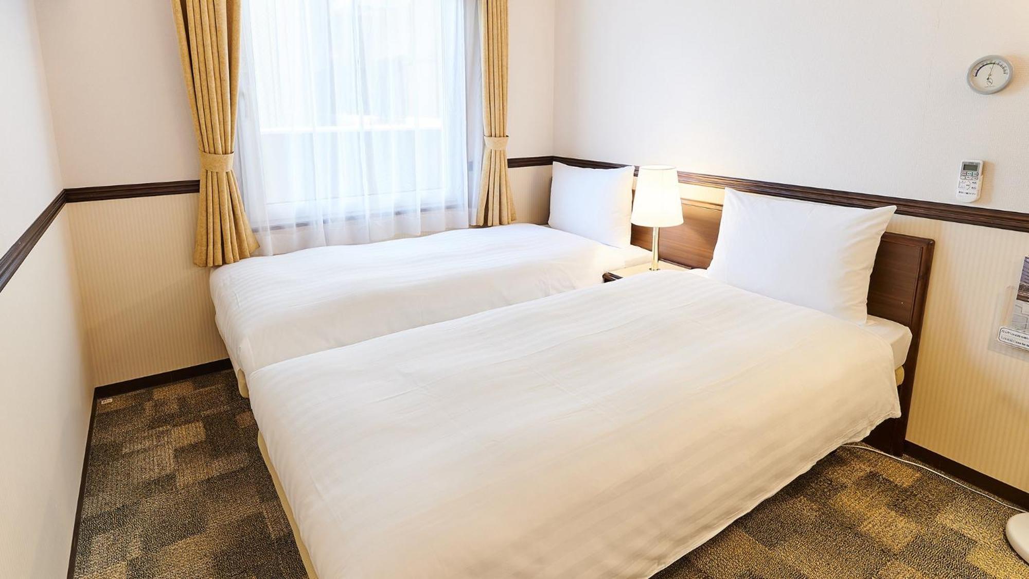 Toyoko Inn Osaka Itami Airport Tojonaka Pokoj fotografie