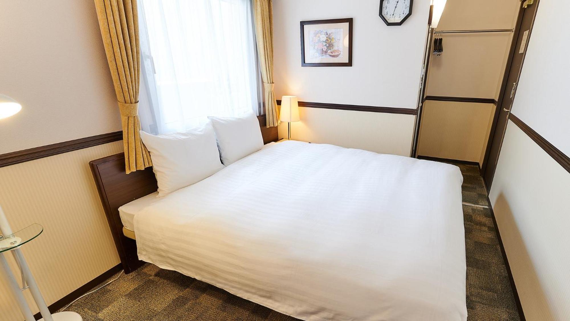 Toyoko Inn Osaka Itami Airport Tojonaka Pokoj fotografie