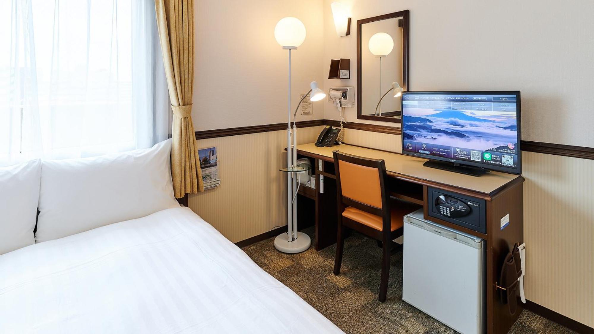 Toyoko Inn Osaka Itami Airport Tojonaka Pokoj fotografie